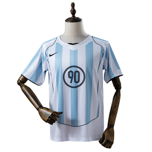 Camiseta Total 90 Azul y Blanca 2025 Versión Fan