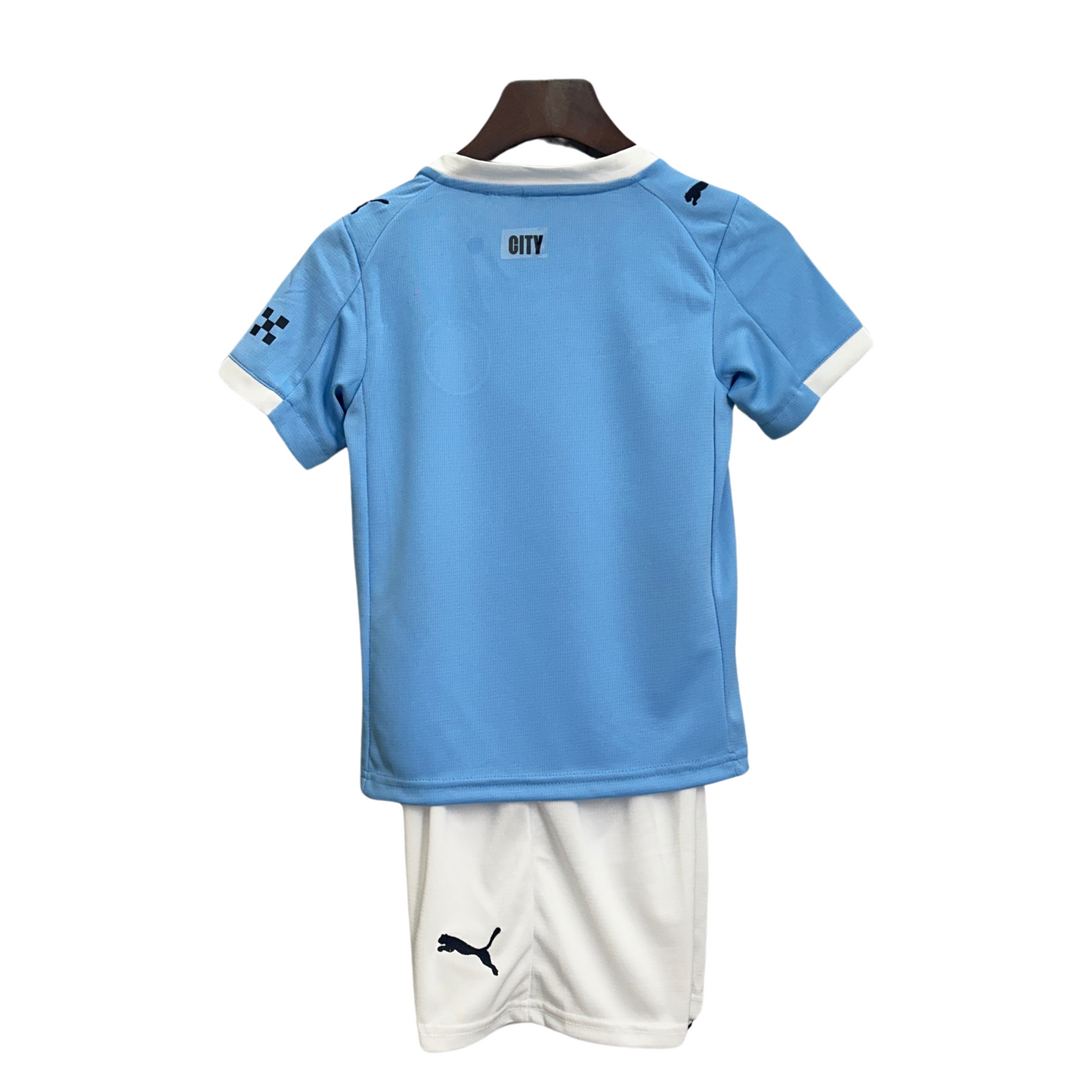 Kit infantil del Manchester City I 25/26 