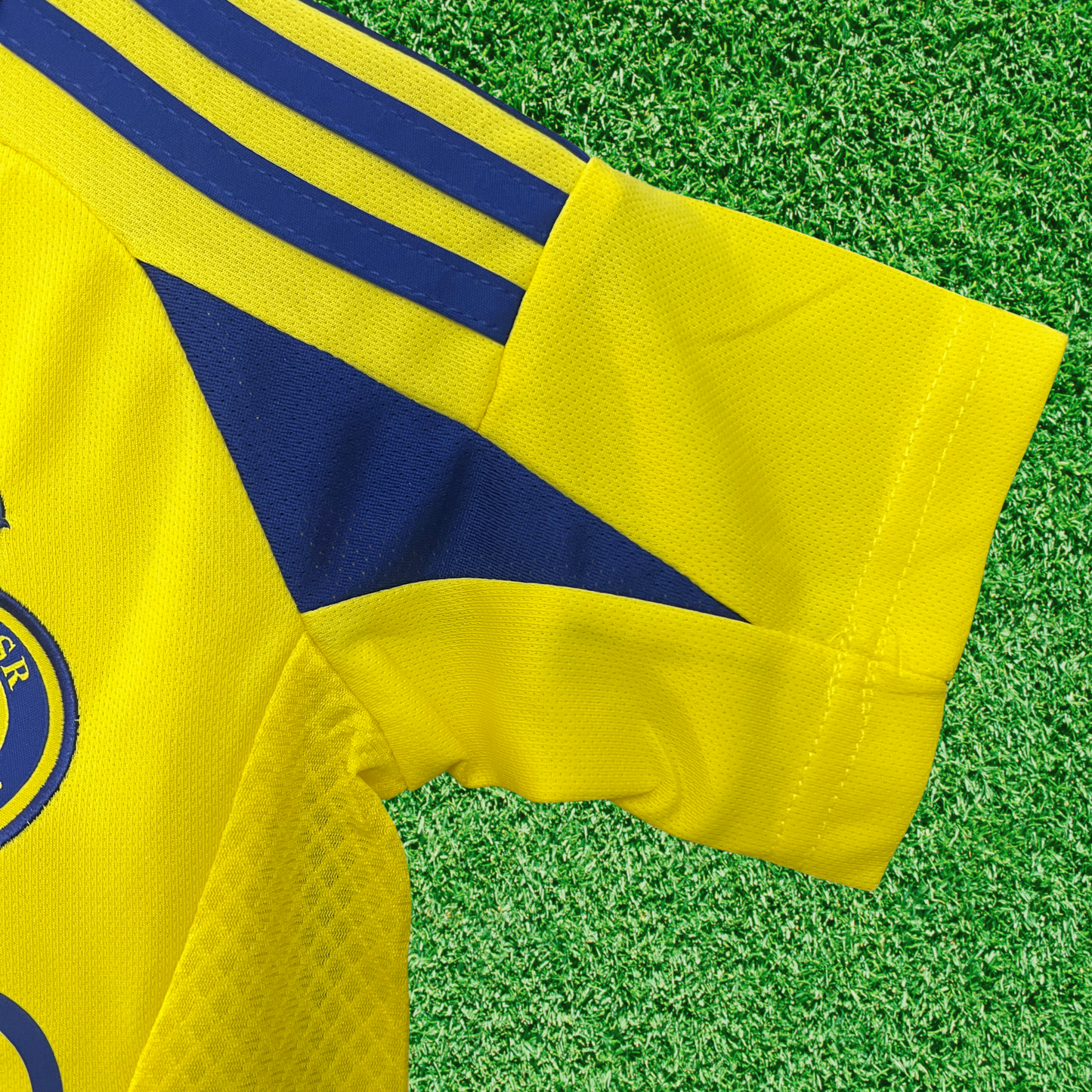 Kit Al-Nassr FC I 24/25 Infantil