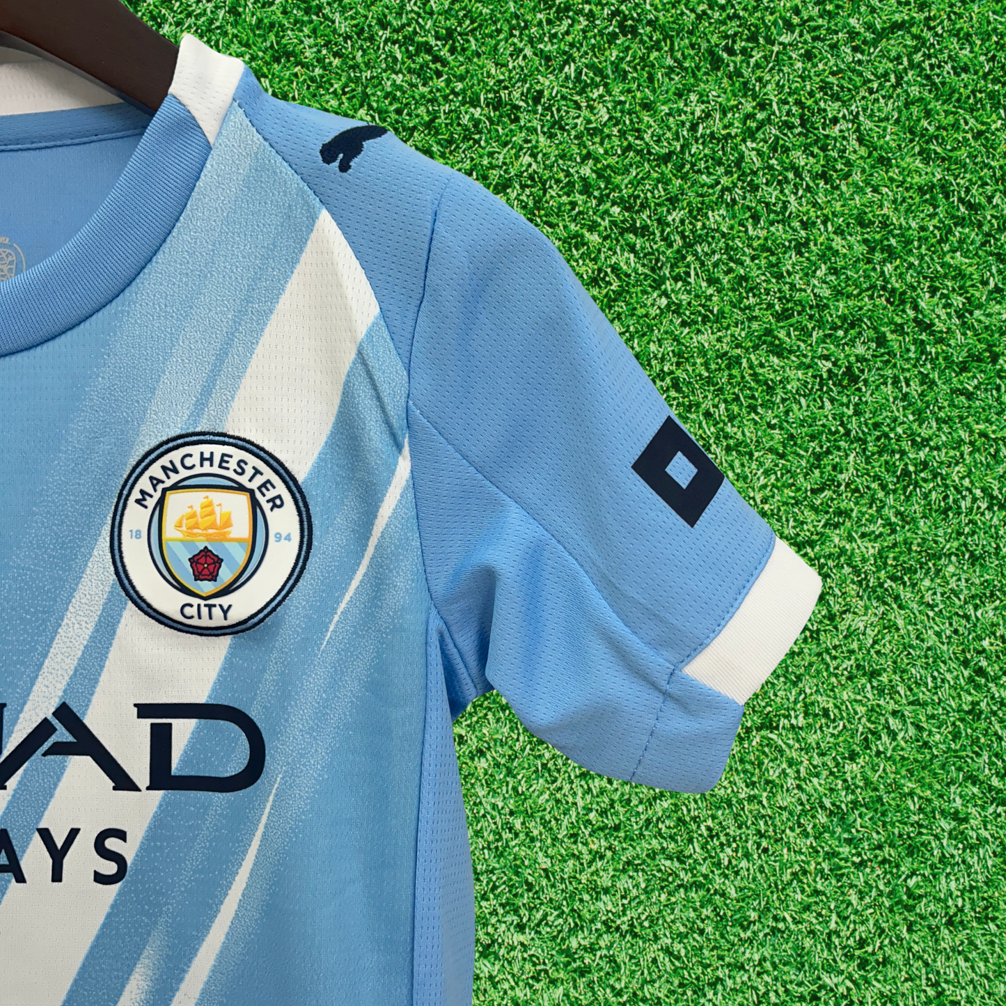 Kit infantil del Manchester City I 25/26 