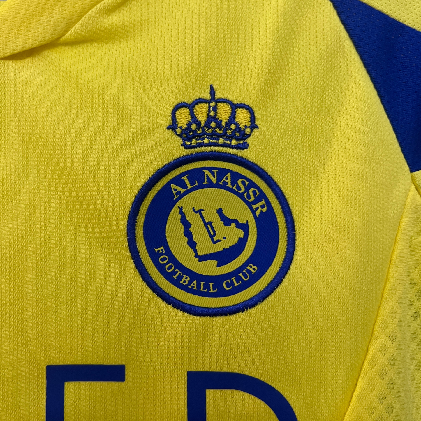 Kit Al-Nassr FC I 24/25 Infantil